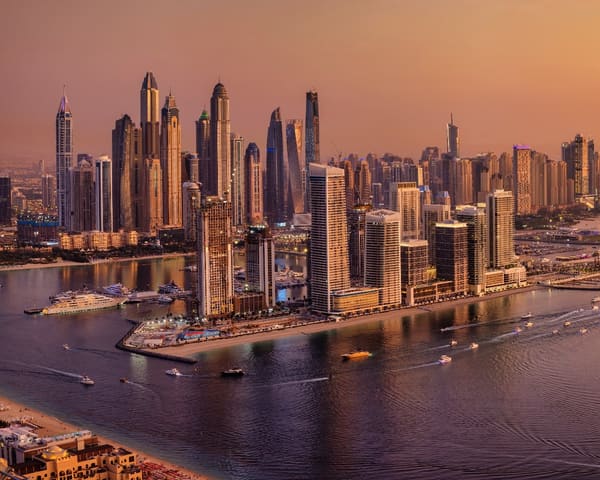 Elevated, panoramic sunset view of the modern Dubai Marina
